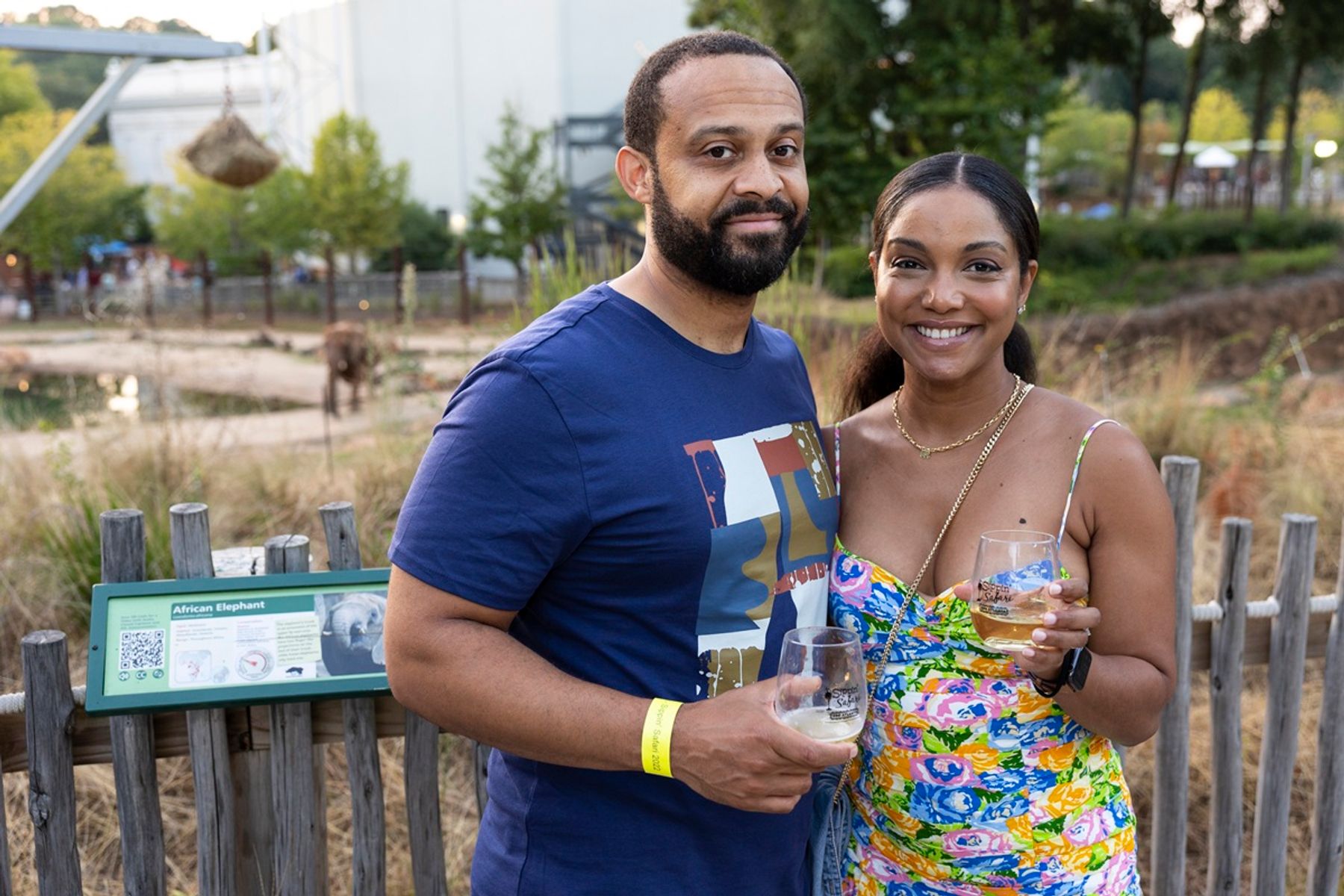 Guests tasting wine among the grounds at Sippin Safari at Zoo Atlanta
