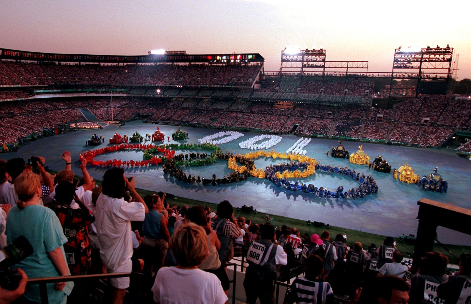 Performers form the Olympic rings during the 1996 Summer Olympic Games opening ceremony in Atlanta, July 19, 1996