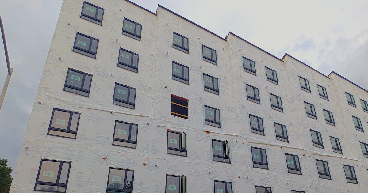 First new building at the Atlanta Civic Center site tops out on Pine Street