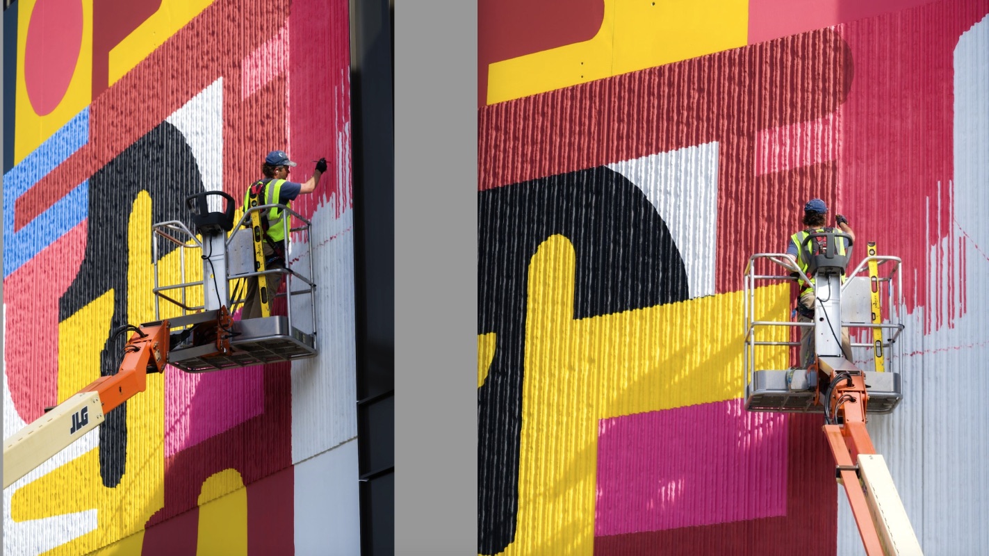 HENSE mural on the western facade of The CTR over Andrew Young International Boulevard