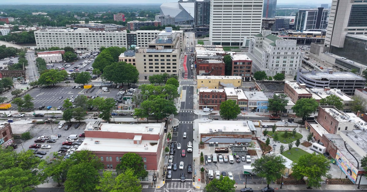 South Downtown pauses construction and lays off four project managers after the World Cup