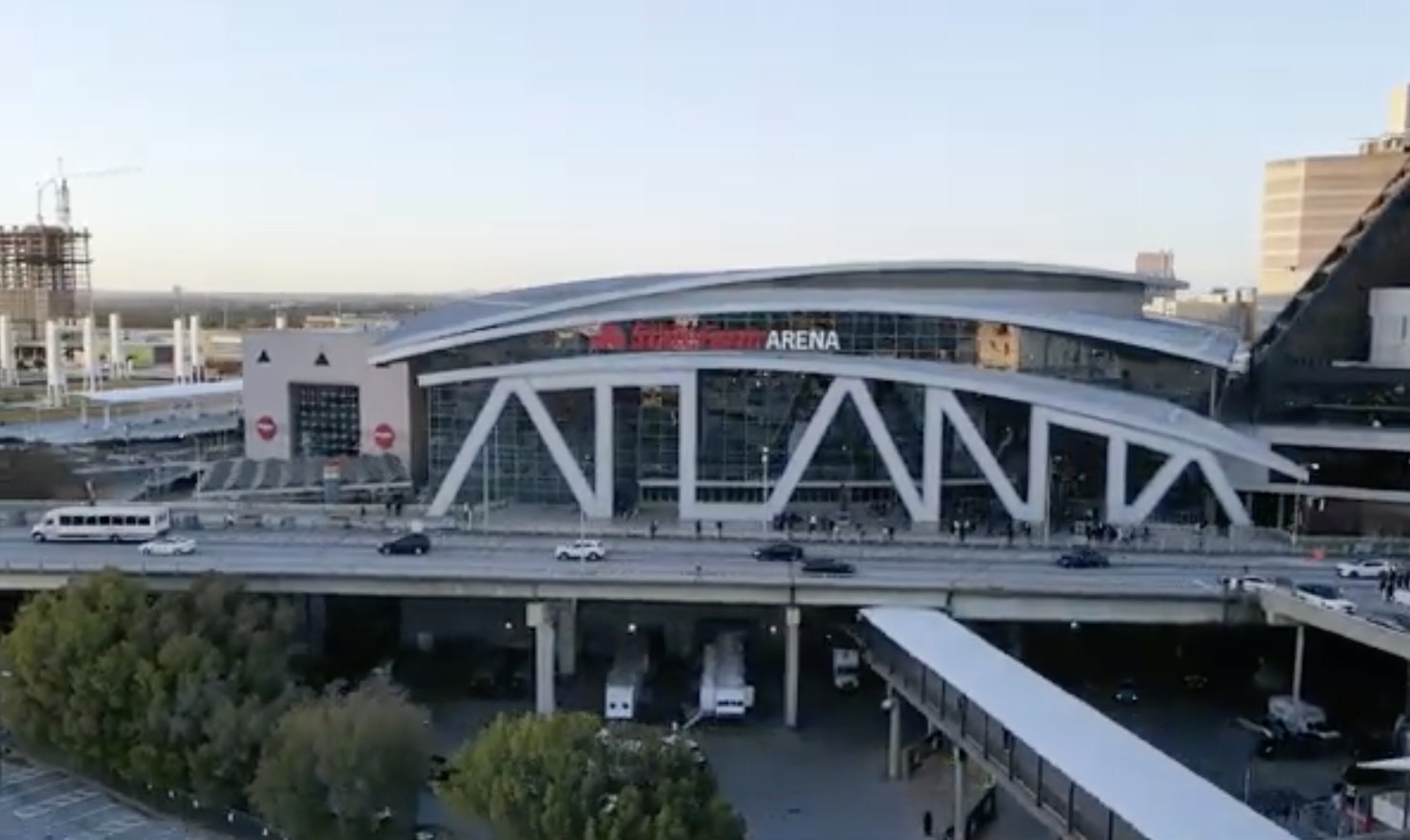 State Farm Arena exterior in downtown Atlanta with its ATL facade seen from across the elevated roadway