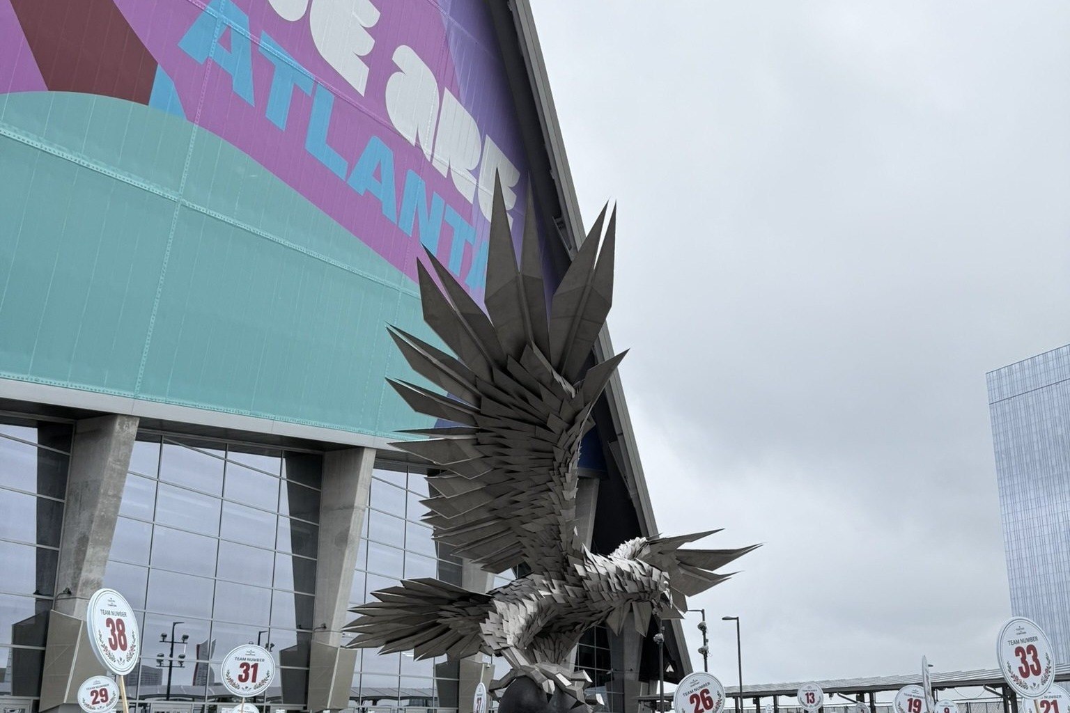 Hundreds of volunteers gathered on June 1 outside Mercedes-Benz Stadium for "Together For Downtown," an effort to beautify the area ahead of the FIFA World Cup matches.