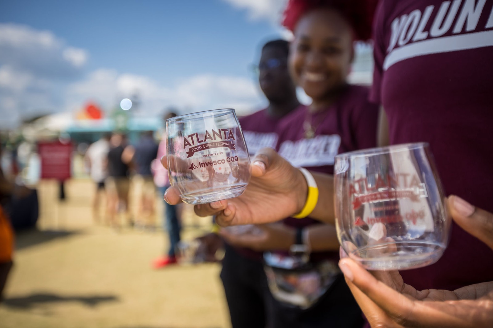Guests sampling dishes under the tasting tents at the Atlanta Food & Wine Festival