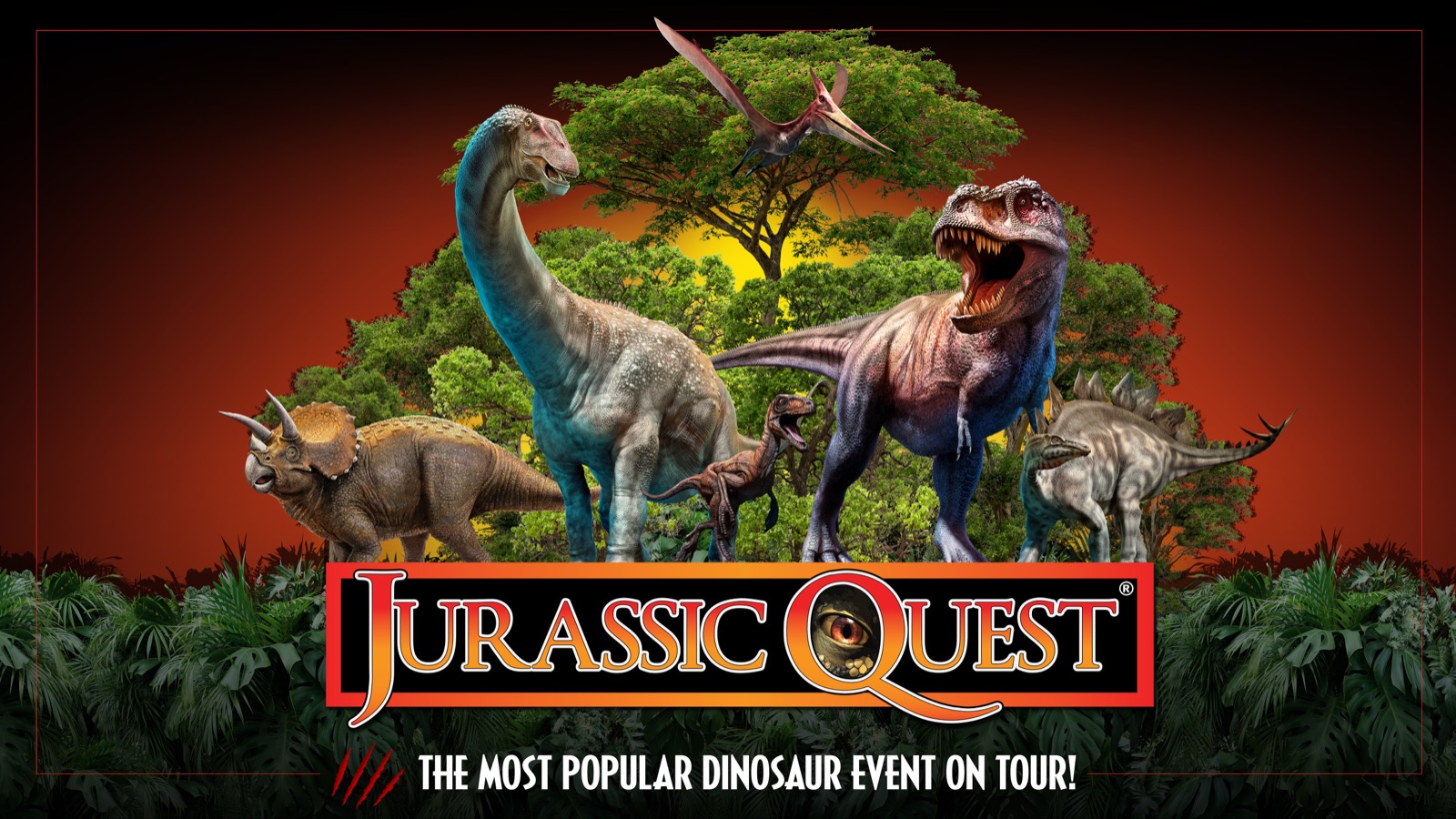 Life-size animatronic dinosaurs on display at a Jurassic Quest indoor exhibition