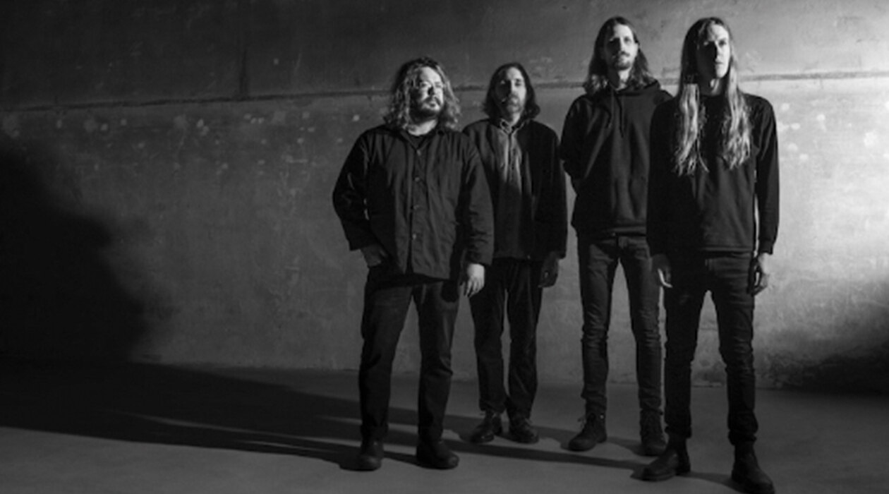 Black-and-white promotional photo of the four members of Elder, who perform with Bask at The Masquerade.