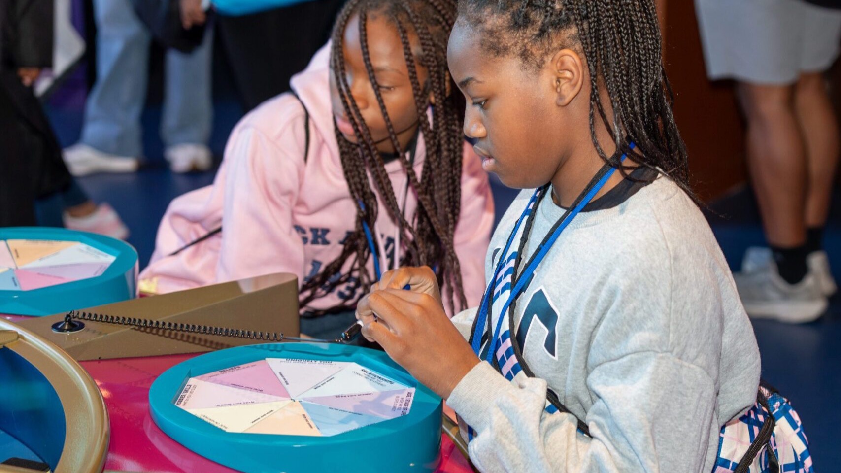 Families exploring the galleries at the National Center for Civil and Human Rights during a Saturday Adventures program